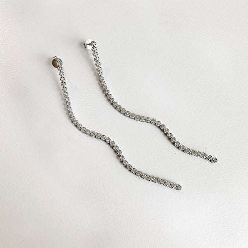 Boucles d'oreilles AITCHES - Boucles d'oreilles tennis en or blanc 18K diamants 58 Facettes GER1349WG