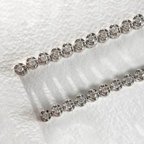 Boucles d'oreilles AITCHES - Boucles d'oreilles tennis en or blanc 18K diamants 58 Facettes GER1349WG