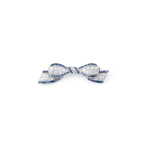 Broche Broche nœud Art déco en platine, diamants et saphirs 58 Facettes 1