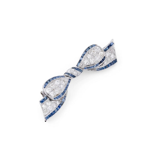 Broche Broche nœud Art déco en platine, diamants et saphirs 58 Facettes 1