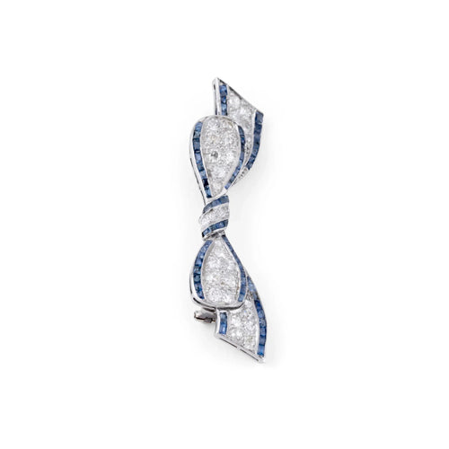 Broche Broche nœud Art déco en platine, diamants et saphirs 58 Facettes 1
