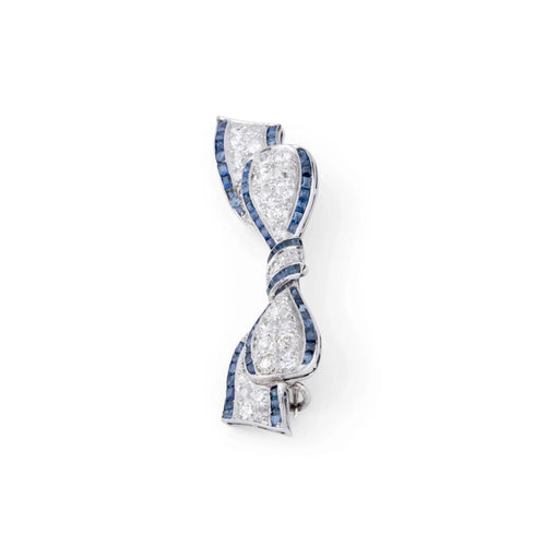 Broche Broche nœud Art déco en platine, diamants et saphirs 58 Facettes 1