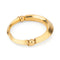 Bracelet Lalaounis - Bracelet jonc ouvrant martelé en or jaune 22k 58 Facettes 1