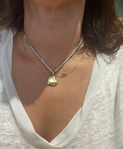 Collier Pomellato Dodo - Collier cœur en argent et or 58 Facettes 1