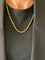 Collier Collier maille grain de café en or jaune 18 carats 58 Facettes N14