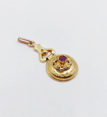 Pendentif Pendentif victorien en or rose 18k, grenat et décorations fleuries 58 Facettes A07105
