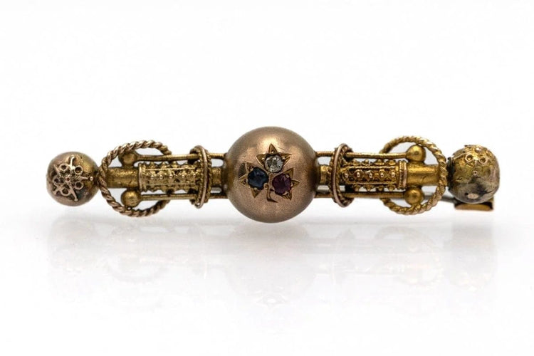 Broche Broche ancienne en or jaune, diamant, rubis et saphir 58 Facettes 9208