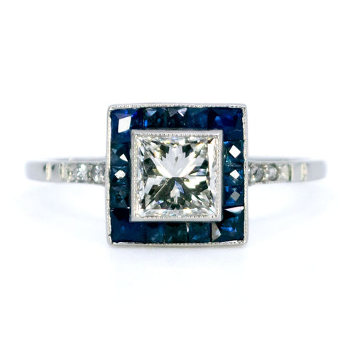 Ring 54 Firkantet ring i Platin med prinsesseslebet diamant og safirer 58 Facettes A52D1E6B2BA848FCB2519AA2A63CA801
