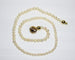 Collier Collier de perles de culture en or jaune 750 et fermoir boule 58 Facettes A11330 A11112