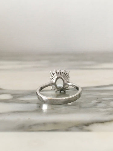 Bague 54 Bague en or blanc 18K sertie d'aigue-marine et diamants 58 Facettes 264