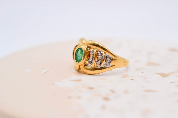https://www.noircarat.fr/wp-content/uploads/2026/05/bague-noeud-emeraude.jpg