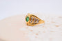https://www.noircarat.fr/wp-content/uploads/2026/05/bague-noeud-emeraude.jpg