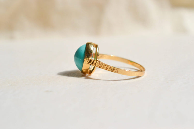 https://www.noircarat.fr/wp-content/uploads/2026/05/bague-cabochon-turquoise.jpg