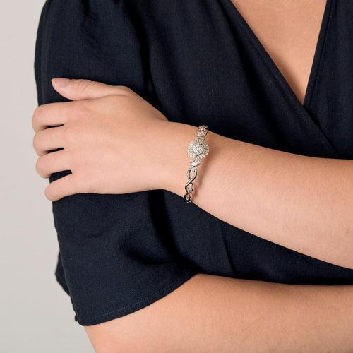Bracelet Bracelet - Jonc torsadé en or blanc et diamants 58 Facettes BO/250007/