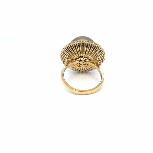 Bague Bague cocktail années 1980 en or jaune 18k, perle dorée et diamants 58 Facettes
