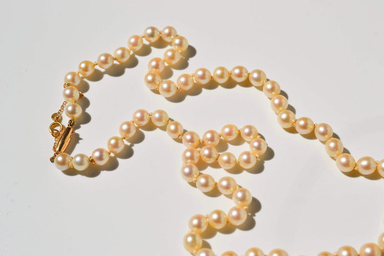https://www.noircarat.fr/wp-content/uploads/2026/04/collier-perles-or-1.jpg