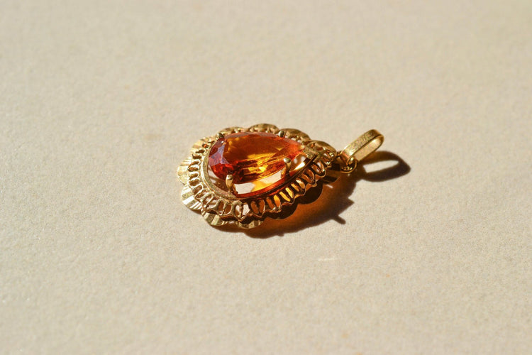 https://www.noircarat.fr/wp-content/uploads/2026/04/pendentif-or-jaune-3.jpg