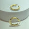 Tvinnade creoler i 18 karat gulguld 58 Facettes 260134