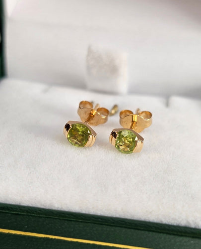 Boucles d'oreilles Boucles d'oreilles puces en or rose et péridots 58 Facettes 738