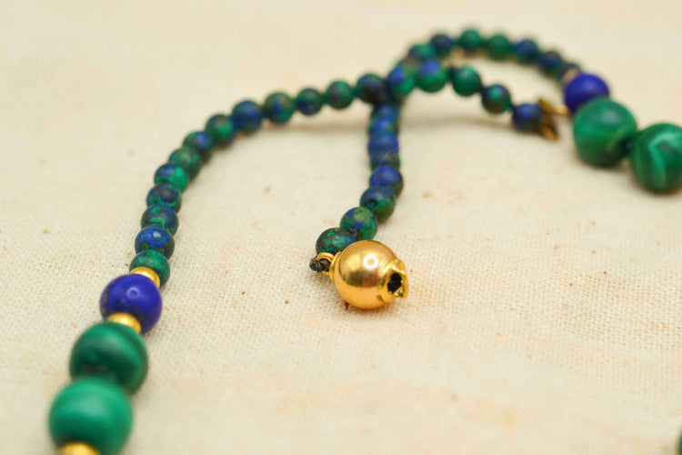 https://www.noircarat.fr/wp-content/uploads/2026/04/collier-malachite-or.jpg
