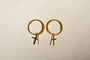 Boucles d'oreilles Boucles d'oreilles mini-créoles croix en or jaune 18 carats 58 Facettes 3949