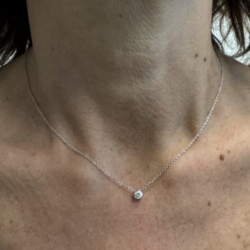 Колиe с централен диамант от бяло злато и диамант 0,18 ct 58 Facettes 39236