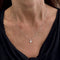 Колиe с централен диамант от бяло злато и диамант 0,24 ct 58 Facettes 39095