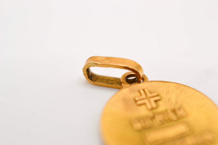https://www.noircarat.fr/wp-content/uploads/2026/04/medaille-damour-ronde.jpg