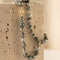 https://cdn.shopify.com/s/files/1/0442/6560/3235/files/tahiti-perlenkette-modular-grau-petrol-95-mmhoney-jewelry-4546984.jpg?v=1772822717