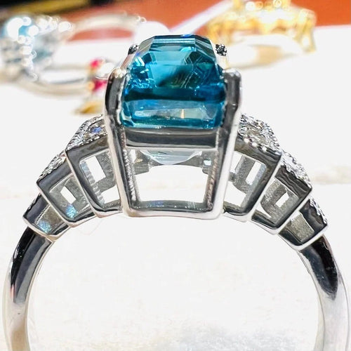 Bague 54 Bague Art déco en or blanc, zircon bleu et diamants 58 Facettes 7849 A
