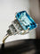 Bague 54 Bague Art déco en or blanc, zircon bleu et diamants 58 Facettes 7849 A