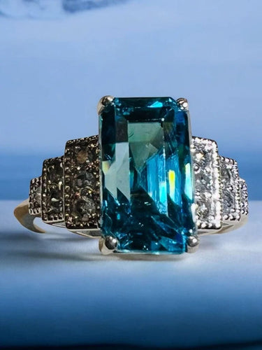 Bague 54 Bague Art déco en or blanc, zircon bleu et diamants 58 Facettes 7849 A