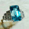 Bague 54 Bague Art déco en or blanc, zircon bleu et diamants 58 Facettes 7849 A