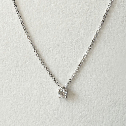 https://cdn.shopify.com/s/files/1/0943/8576/6747/files/chaine-or-blanc-diamant.jpg?v=1776785585