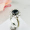 https://cdn.shopify.com/s/files/1/0442/6560/3235/products/weissgoldring-mit-brillanten-und-saphiren-honey-decoration-2.jpg?v=1776494482