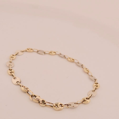Bracelet Bracelet grain de café en or jaune et blanc 18 carats 58 Facettes 3042144