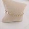 Bracelet Bracelet grain de café en or jaune et blanc 18 carats 58 Facettes 3042144