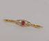 Broche Broche en or jaune, grenat et diamants 58 Facettes 3042187
