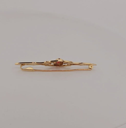 Broche Broche en or jaune, grenat et diamants 58 Facettes 3042187