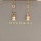 Boucles d'oreilles Bulgari B.zero1 - Boucles d’oreilles en or jaune avec charms pendants 58 Facettes 23033
