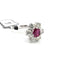 Bague 55 Bague en or blanc 18 kt avec rubis central et diamants 58 Facettes 322/26 C