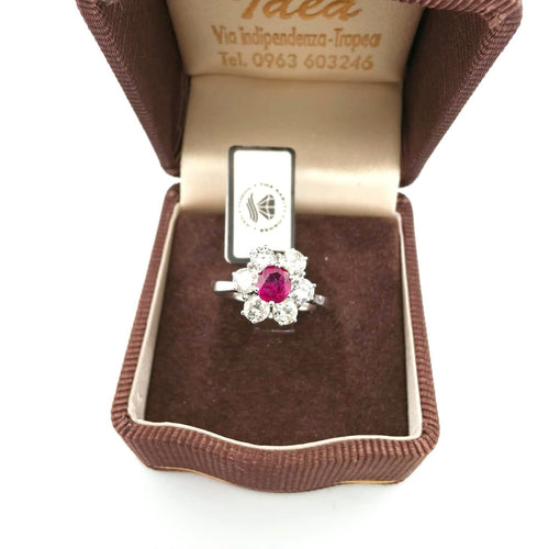 Bague 55 Bague en or blanc 18 kt avec rubis central et diamants 58 Facettes 322/26 C