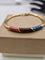 Bracelet Vintage - Bracelet jonc en or jaune et émail 58 Facettes CV-061