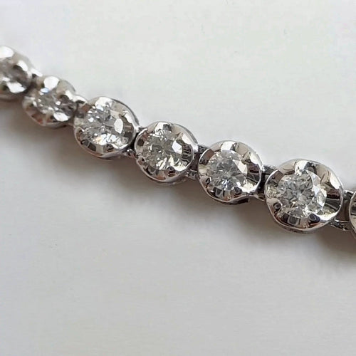 Collier AITCHES - Collier tennis dégradé en or blanc 18K et diamants 58 Facettes GPD1055WG
