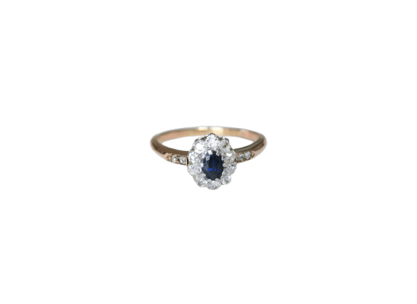 Bague 61 Bague marguerite ancienne en or rose, platine, saphir et diamants 58 Facettes