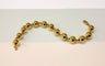 Marseillainen rannekoru 18K kultapalloilla 58 Facettes brac.boul.1932