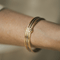 Гривна Cartier Trinity - Отваряща се твърда гривна от три вида злато 58 Facettes 50232