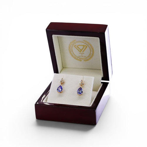 Boucles d'oreilles Boucles d'oreilles en or jaune, tanzanites et diamants 58 Facettes E011