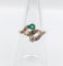 Bague 51.5 Bague tourbillon antique en or 18k, émeraude et diamants 58 Facettes A07258