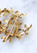 Boucles d'oreilles Hermès - Broche clip Feuillage en or jaune 58 Facettes